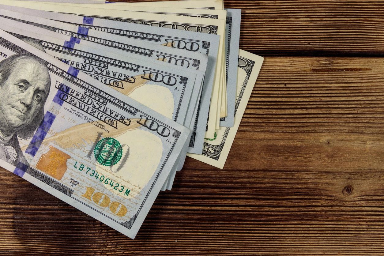 A close up of some money on top of a table